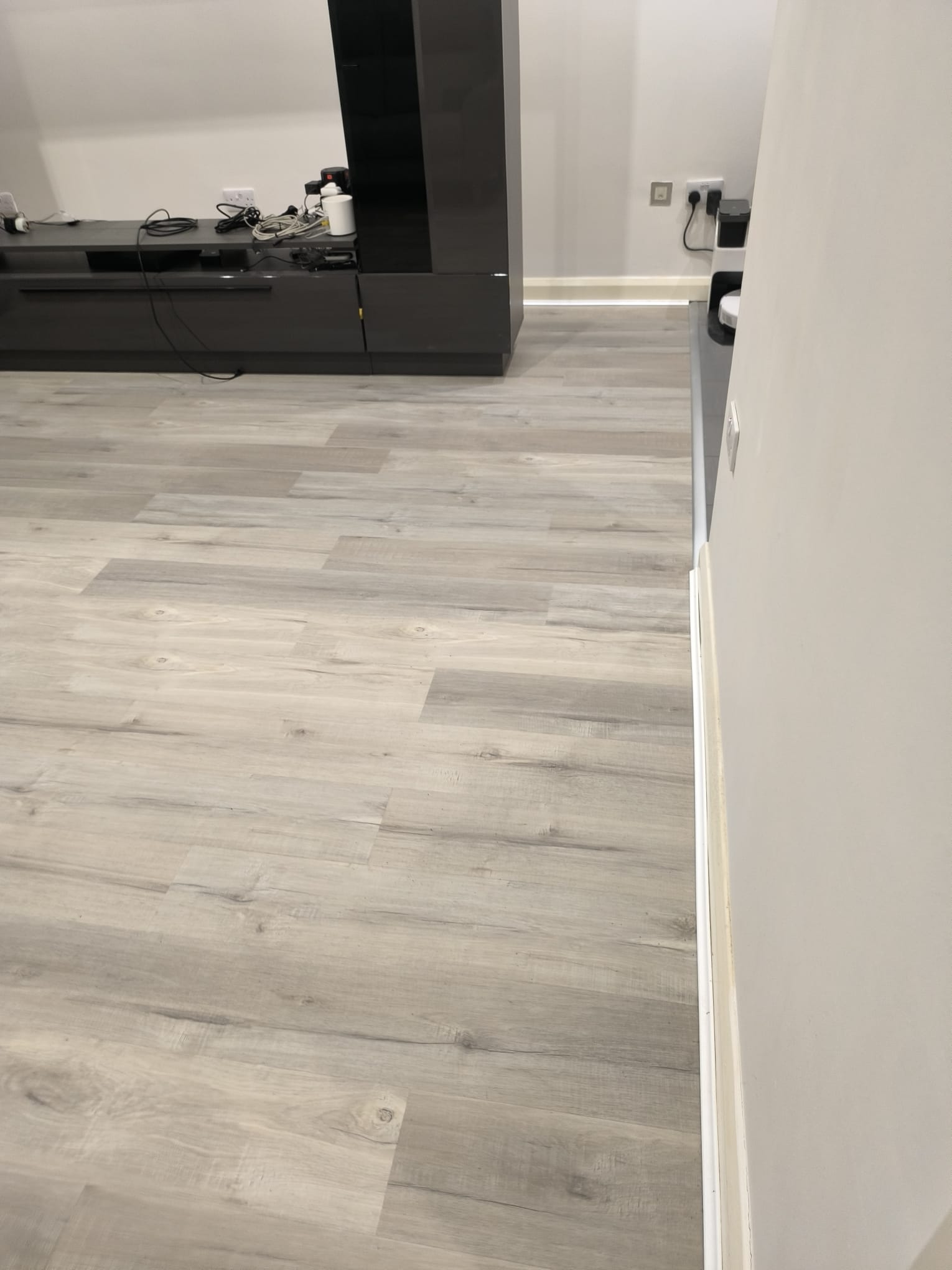 Professional SPC flooring installation in Watford apartment